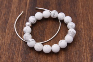 silver and white bracelets