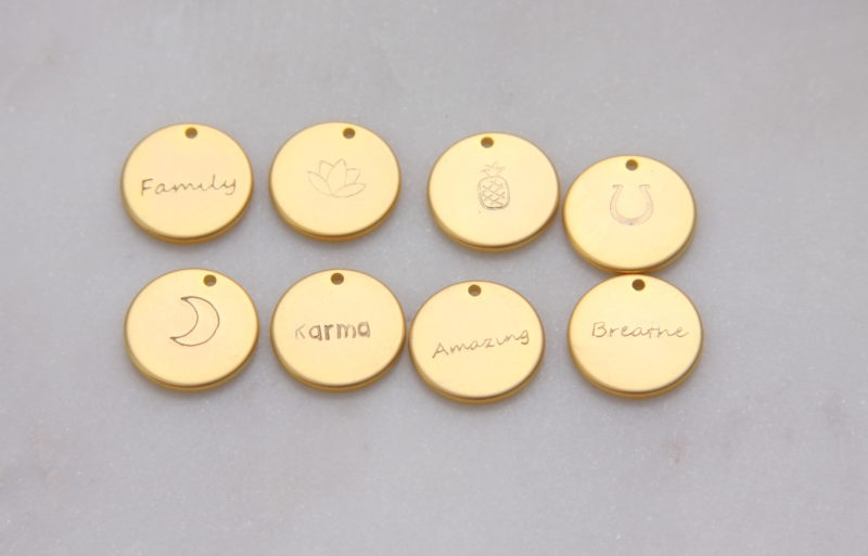 hand stamped gold charms by Reija Eden